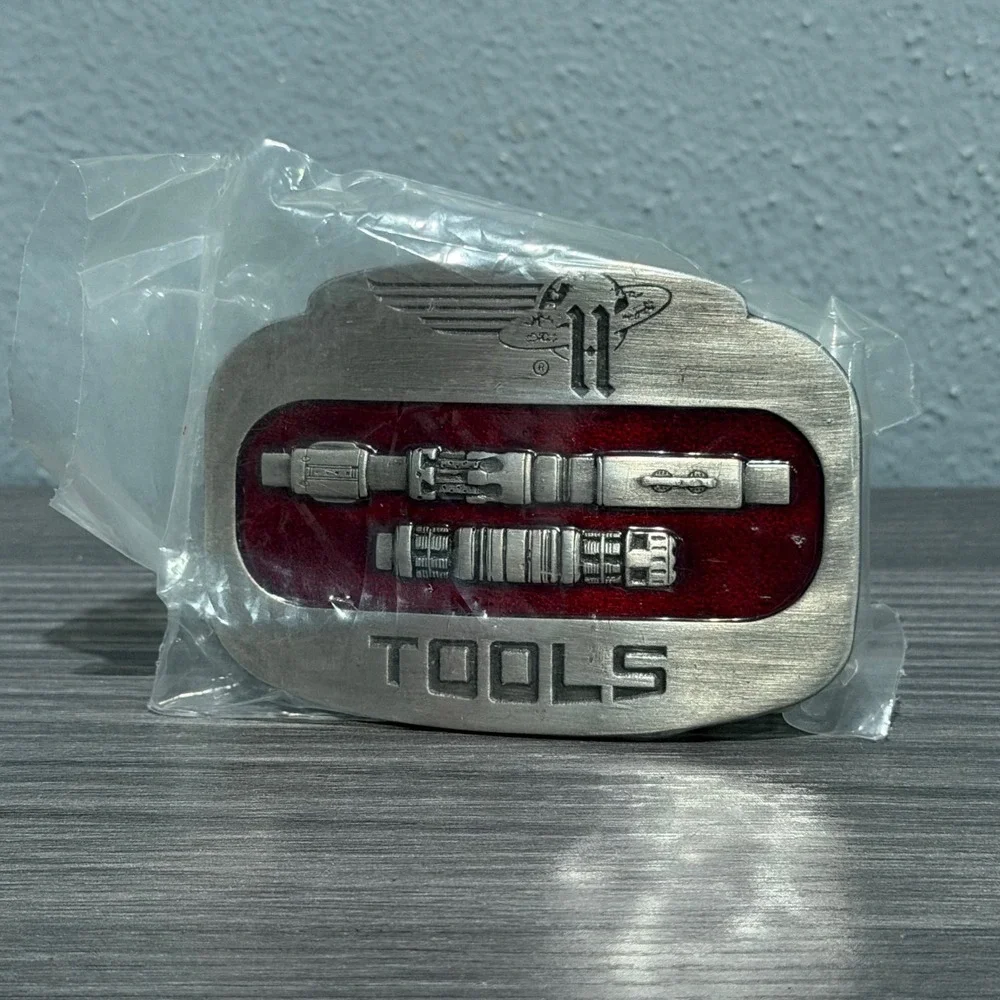 Vintage General Graphics Tools Belt Buckle Pewter Red Enamel Made in USA Sci-Fi